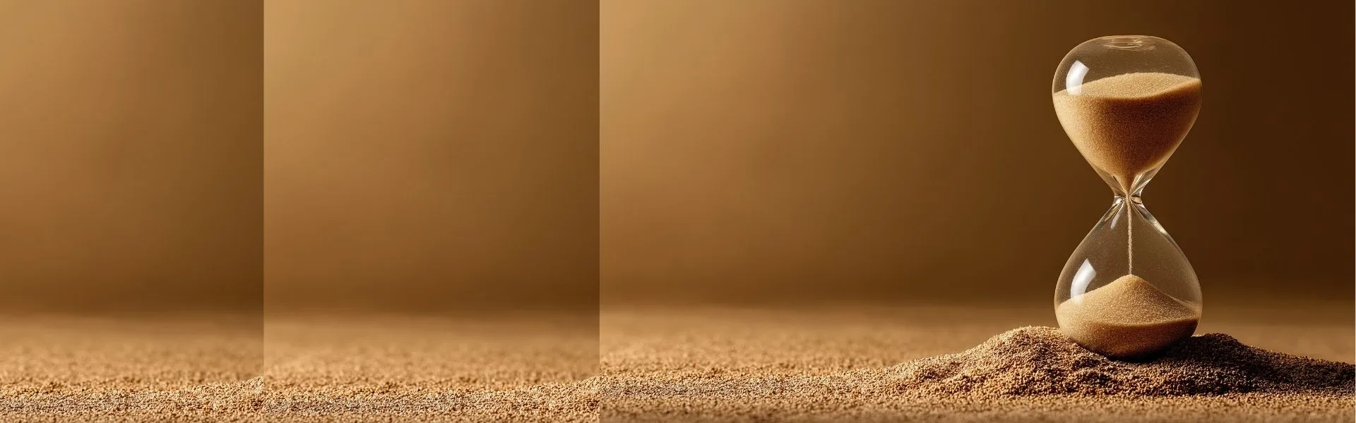 Hourglass with sand falling, sitting on a sandy surface against a warm brown background, representing part-time franchise opportunities in the UK.